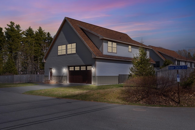 3 Bogue Chitto Ln Unit 1, Bar Harbor, ME 04609 - view of front of property featuring a garage, aphalt driveway, and fence