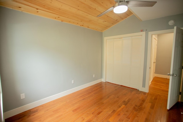 16 Main St, Bradley, ME 04411 - unfurnished bedroom with vaulted ceiling, a closet, light wood finished floors, and a ceiling fan