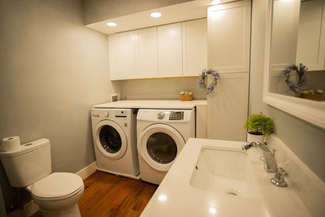 16 Main St, Bradley, ME 04411 - half bathroom with separate washer and dryer, wood finished floors, and recessed lighting
