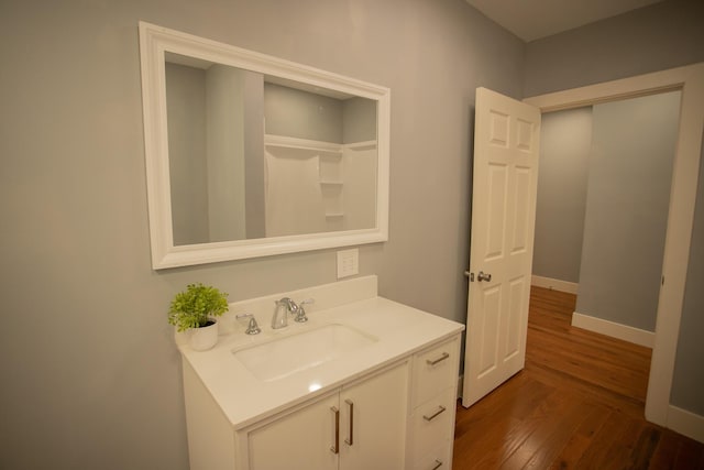16 Main St, Bradley, ME 04411 - bathroom with vanity and wood finished floors