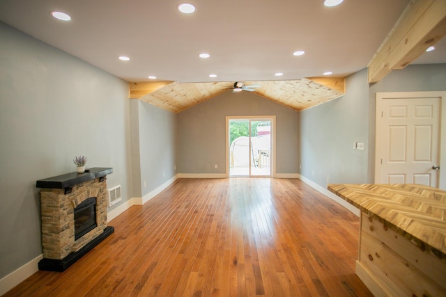 16 Main St, Bradley, ME 04411 - unfurnished living room with ceiling fan, light wood-type flooring, a fireplace, lofted ceiling, and recessed lighting