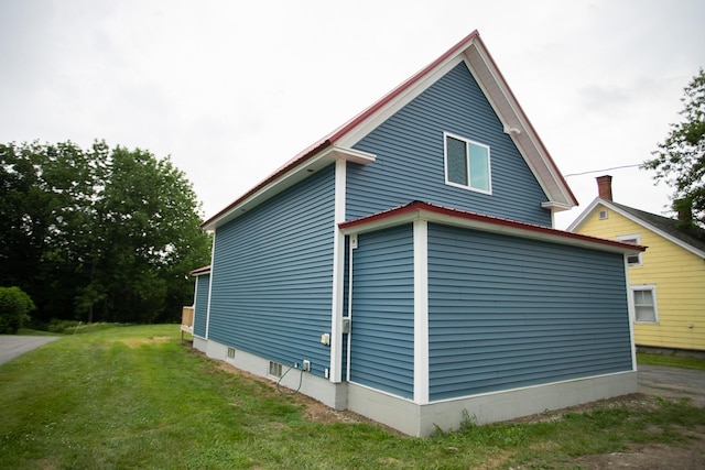 16 Main St, Bradley, ME 04411 - view of side of property featuring a lawn