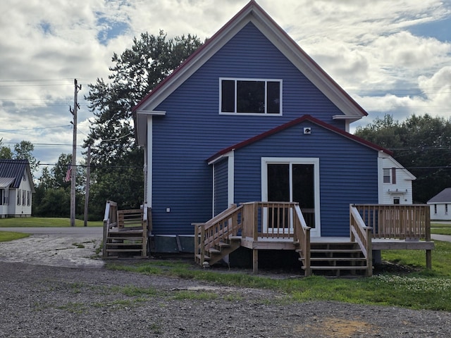 16 Main St, Bradley, ME 04411 - rear view of house with a wooden deck