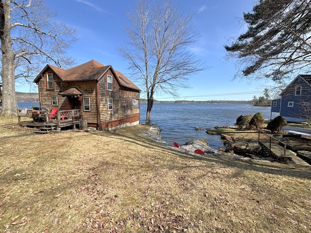 81 Shore Dr, Sabattus, ME 04280 - view of home's exterior with a deck with water view