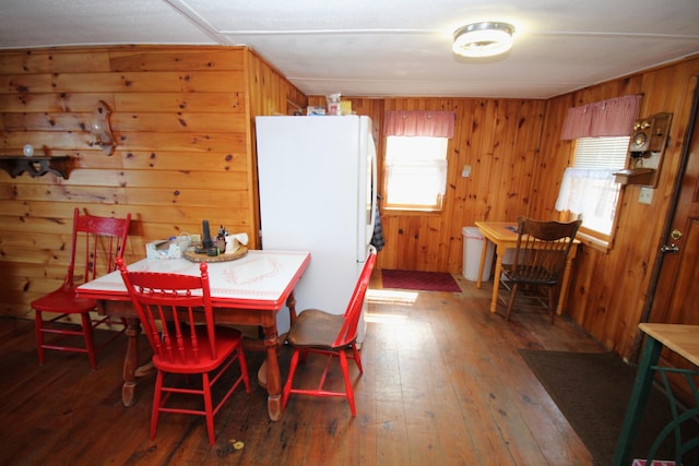 81 Shore Dr, Sabattus, ME 04280 - dining area featuring wood-type flooring and wood walls