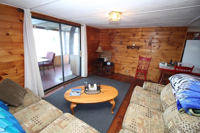 81 Shore Dr, Sabattus, ME 04280 - living room with wood finished floors and wooden walls