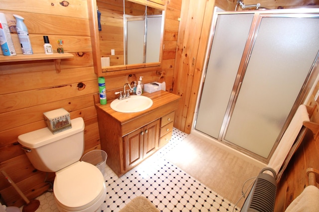 81 Shore Dr, Sabattus, ME 04280 - full bath with vanity, a shower stall, wooden walls, and tile patterned floors