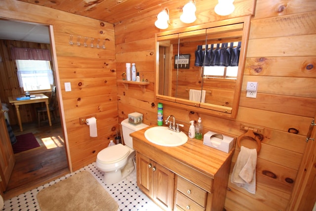 81 Shore Dr, Sabattus, ME 04280 - bathroom featuring vanity and wooden walls