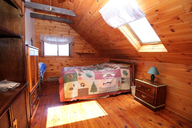 81 Shore Dr, Sabattus, ME 04280 - bedroom with a skylight, vaulted ceiling, wood walls, hardwood / wood-style flooring, and a baseboard heating unit
