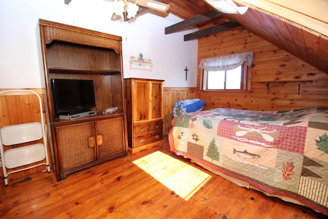 81 Shore Dr, Sabattus, ME 04280 - bedroom featuring wood walls, vaulted ceiling, a wainscoted wall, wood-type flooring, and wooden ceiling
