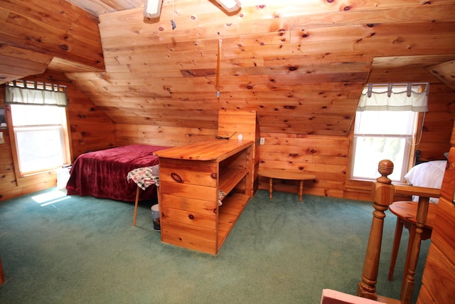 81 Shore Dr, Sabattus, ME 04280 - bedroom featuring multiple windows, carpet, wood walls, wooden ceiling, and vaulted ceiling