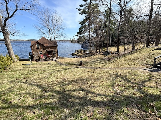 81 Shore Dr, Sabattus, ME 04280 - dock area featuring a water view and a lawn