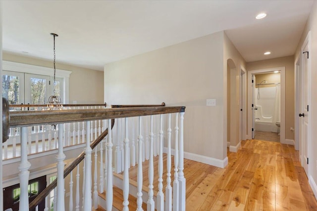 66 Grant Rd, Saco, ME 04072 - hallway featuring recessed lighting, baseboards, an upstairs landing, and light wood-style flooring