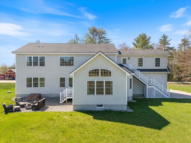 66 Grant Rd, Saco, ME 04072 - rear view of house featuring a lawn and stairs