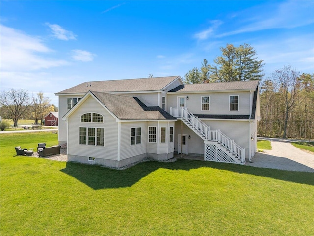 66 Grant Rd, Saco, ME 04072 - back of house featuring a lawn, roof with shingles, and stairway