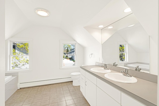 full bath featuring a sink, a healthy amount of sunlight, baseboard heating, and lofted ceiling