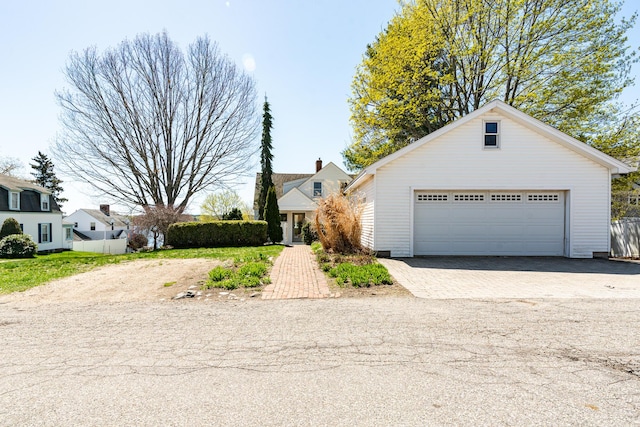 view of front facade featuring an outbuilding
