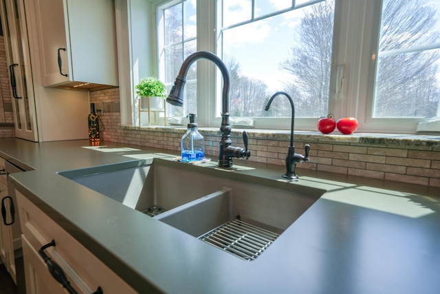 219 Middle Rd, Skowhegan, ME 04976 - kitchen view of a sink and decorative backsplash