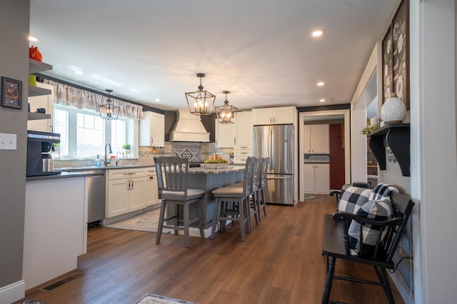 219 Middle Rd, Skowhegan, ME 04976 - dining room featuring a chandelier, dark wood-style floors, and recessed lighting