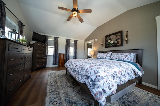219 Middle Rd, Skowhegan, ME 04976 - bedroom with vaulted ceiling, dark wood-style floors, and ceiling fan