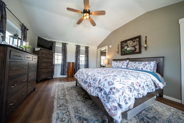 219 Middle Rd, Skowhegan, ME 04976 - bedroom with vaulted ceiling, dark wood-style flooring, multiple windows, and ceiling fan