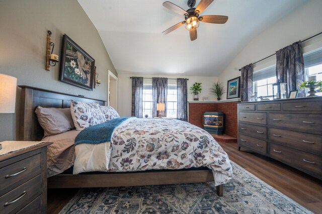 219 Middle Rd, Skowhegan, ME 04976 - bedroom featuring vaulted ceiling, multiple windows, dark wood-style floors, and a ceiling fan
