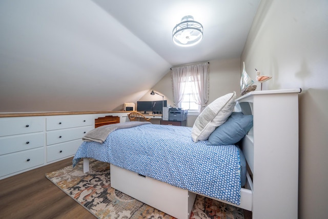 219 Middle Rd, Skowhegan, ME 04976 - bedroom featuring wood finished floors and vaulted ceiling