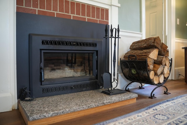 219 Middle Rd, Skowhegan, ME 04976 - detailed view of wood finished floors and a glass covered fireplace