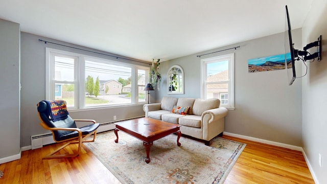134 Saco St, Westbrook, ME 04092 - living area with light wood finished floors and baseboards