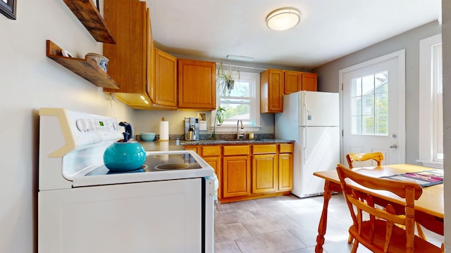 134 Saco St, Westbrook, ME 04092 - kitchen featuring white appliances, a sink, open shelves, and brown cabinetry
