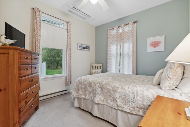 454 Post Rd Unit 456, Wells, ME 04090 - bedroom with a baseboard radiator, carpet, and a ceiling fan
