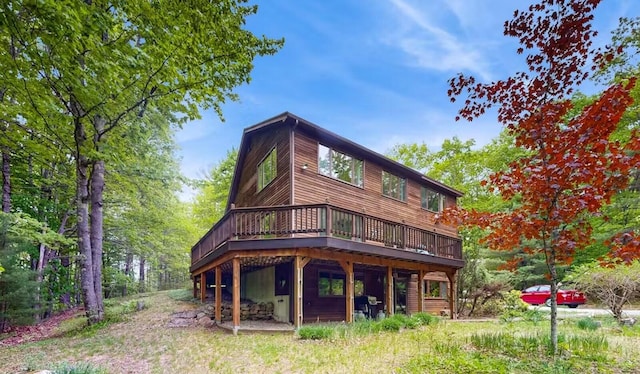 rear view of house with a deck