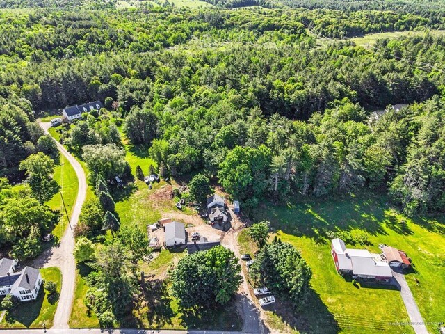 aerial view with a wooded view