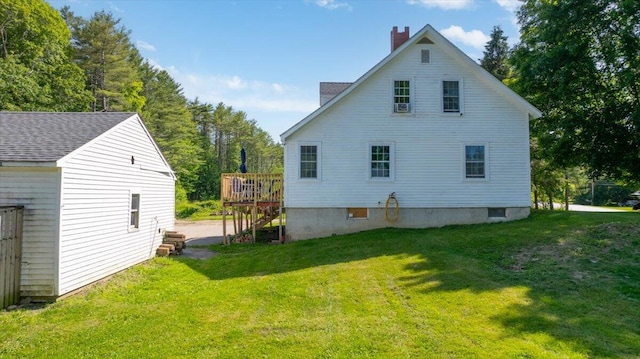 817 Riverside Dr, Augusta, ME 04330 - rear view of house featuring a chimney, a yard, a deck, and stairway