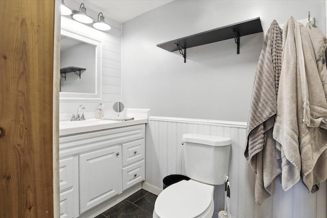 817 Riverside Dr, Augusta, ME 04330 - bathroom with vanity and wainscoting