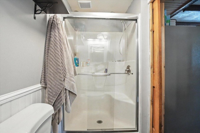 817 Riverside Dr, Augusta, ME 04330 - bathroom with a shower stall and wainscoting