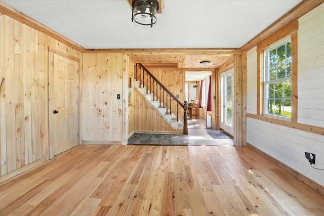 817 Riverside Dr, Augusta, ME 04330 - foyer entrance featuring wood-type flooring, stairway, and wooden walls