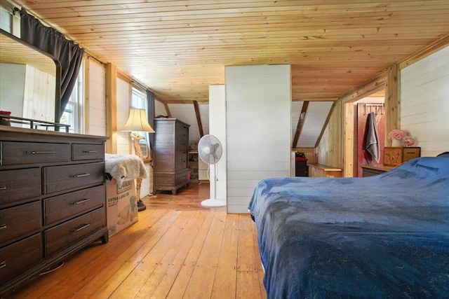 817 Riverside Dr, Augusta, ME 04330 - bedroom with wooden ceiling, wood walls, and light wood-style flooring