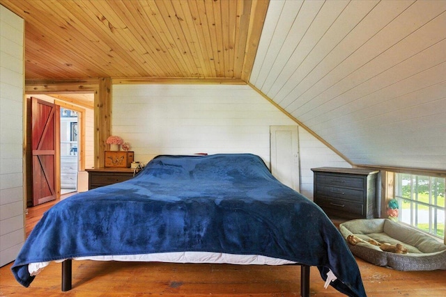 817 Riverside Dr, Augusta, ME 04330 - bedroom featuring wooden ceiling, wooden walls, wood finished floors, and vaulted ceiling