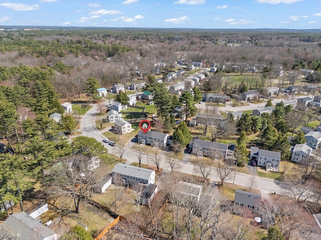 bird's eye view with a residential view and a wooded view