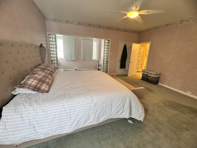 carpeted bedroom featuring a ceiling fan and baseboards