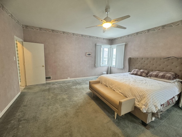 bedroom featuring carpet, visible vents, baseboards, and ceiling fan