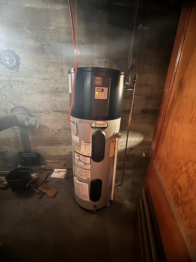 utility room with heat pump water heater