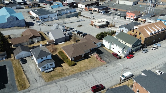 birds eye view of property with a residential view