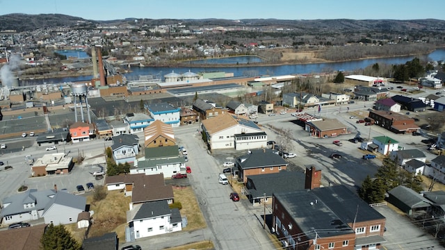 bird's eye view featuring a water and mountain view
