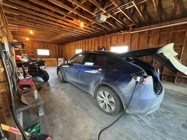 garage featuring a garage door opener