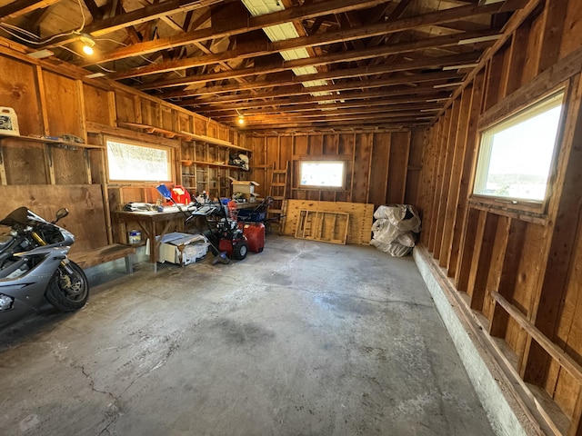 interior space with a garage and concrete flooring