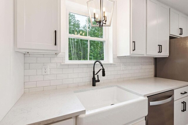 LOT87-1-2 Drown Rd, Alfred, ME 04002 - kitchen with stainless steel dishwasher, a sink, decorative backsplash, and white cabinets