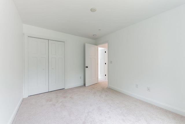 LOT87-1-2 Drown Rd, Alfred, ME 04002 - unfurnished bedroom featuring baseboards, carpet flooring, and a closet