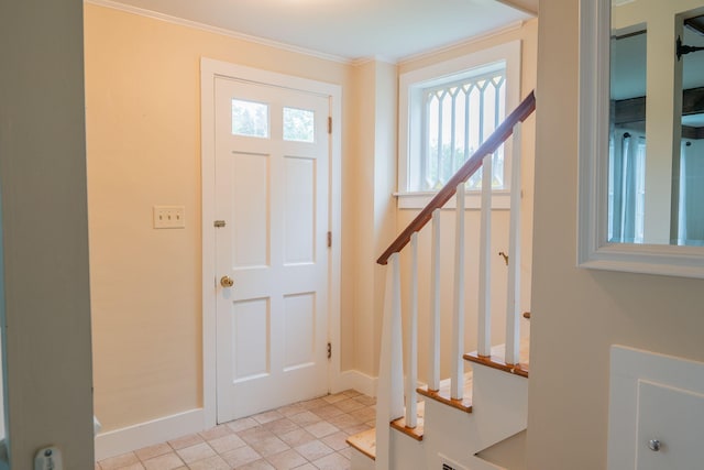 228 Atlantic Ave, Boothbay Harbor, ME 04538 - entryway featuring stairway and crown molding